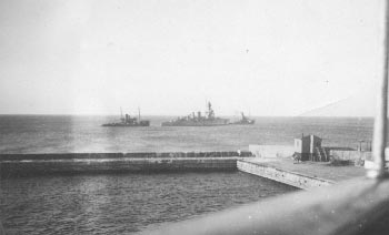 NIELS IUEL is towed out of Isefjorden