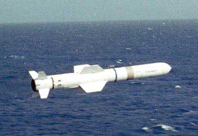 The HARPOON missile in a low altitude flying over the ocean